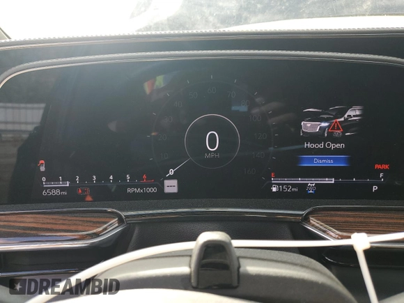 2024 Cadillac Escalade 4WD Premium Luxury with VIN 1GYS4BKL1RR181502, listed as a Copart auction lot 77155704 with 6,588 mi miles and Salvage title. Bid and sale history available at DreamBid. Image 9.