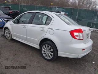 2010 Suzuki SX4 with VIN JS2YC5A43A6300225, listed as a IAAI auction lot 41654094 with 60,098 mi miles and . Bid and sale history available at DreamBid. Image 3.