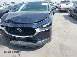 2023 Mazda CX-30 S Carbon Edition with VIN 3MVDMBCM4PM542160, listed as a IAAI auction lot 42175395 with 11,340 mi miles and . Bid and sale history available at DreamBid. Image 6.