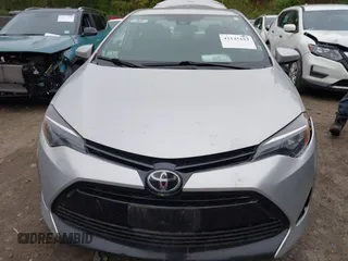 2018 Toyota Corolla L with VIN 2T1BURHE5JC007745, listed as a IAAI auction lot 42145183 with 152,661 mi miles and . Bid and sale history available at DreamBid. Image 12.