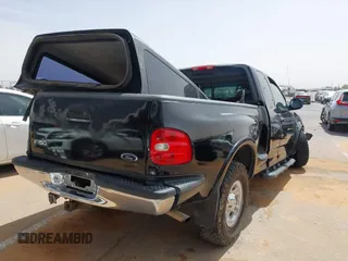 1999 Ford F-150 XL with VIN 1FTRX08L3XKB12260, listed as a IAAI auction lot 42244781 with Not provided miles and . Bid and sale history available at DreamBid. Image 4.