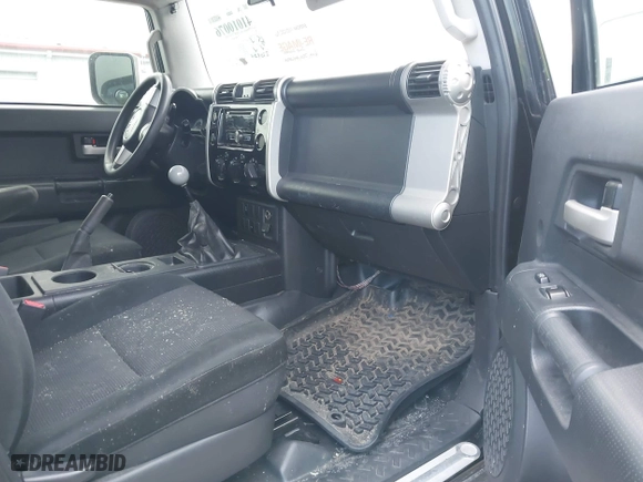 2008 Toyota FJ Cruiser with VIN JTEBU11F780104062, listed as a IAAI auction lot 41010076 with 220,975 mi miles. Bid and sale history available at carsss.com. Image 5.