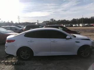 2019 Kia Optima LX with VIN 5XXGT4L36KG344923, listed as a IAAI auction lot 41101973 with 153,350 mi miles and . Bid and sale history available at DreamBid. Image 13.
