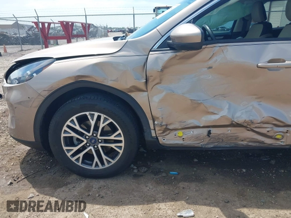 2020 Ford Escape SEL with VIN 1FMCU0H69LUB23895, listed as a IAAI auction lot 42266341 with 88,773 mi miles and . Bid and sale history available at DreamBid. Image 6.