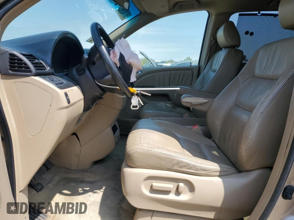 2006 Honda Odyssey EX-L z VIN 5FNRL38726B425098, wystawiony jako Copart lot #56143585 z przebiegiem 153 137 mil mil oraz Szkoda całkowita • Salvage title. Historia ofert i sprzedaży dostępna na DreamBid. Obrazek 7.