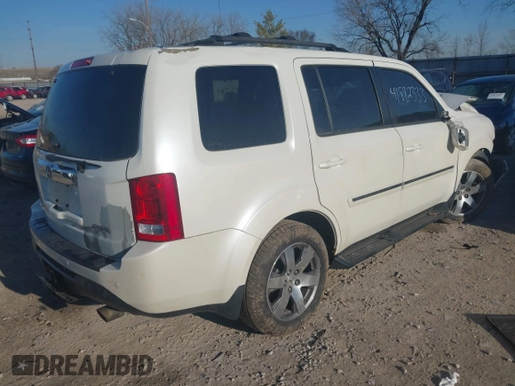 2014 Honda Pilot Touring with VIN 5FNYF4H96EB027336, listed as a IAAI auction lot 41882333 with 202,426 mi miles and . Bid and sale history available at carsss.com. Image 4.