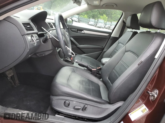 2014 Volkswagen Passat Wolfsburg Edition with VIN 1VWAS7A30EC028920, listed as a Copart auction lot 57174285 with 129,797 mi miles and Salvage title. Bid and sale history available at DreamBid. Image 7.