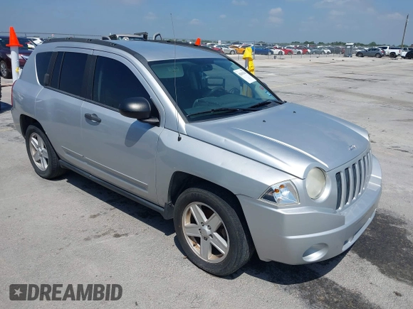 2008 Jeep Compass Sport with VIN 1J8FT47048D767281, listed as a IAAI auction lot 42010343 with 164,734 mi miles. Bid and sale history available at carsss.com. Image 1.