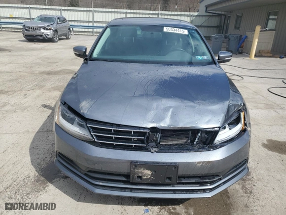 2018 Volkswagen Jetta 1.4T SE with VIN 3VWDB7AJ5JM240877, listed as a Copart auction lot 50334415 with 49,424 mi miles and Salvage Title. Bid and sale history available at carsss.com. Image 5.