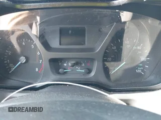 2015 Ford Transit z VIN 1FTNE1CM8FKB16085, wystawiony jako IAAI lot #42438768 z przebiegiem Nie podano mil oraz . Historia ofert i sprzedaży dostępna na DreamBid. Obrazek 7.