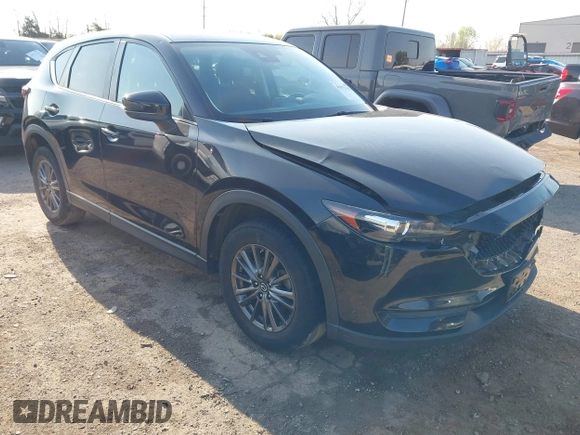 2019 Mazda CX-5 Touring with VIN JM3KFACM6K0533203, listed as a IAAI auction lot 41973125 with 106,882 mi miles and . Bid and sale history available at carsss.com. Image 1.