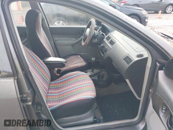 2007 Ford Focus S z VIN 1FAFP34N17W212691, wystawiony jako IAAI lot #42130099 z przebiegiem 214 101 mil mil oraz . Historia ofert i sprzedaży dostępna na DreamBid. Obrazek 5.