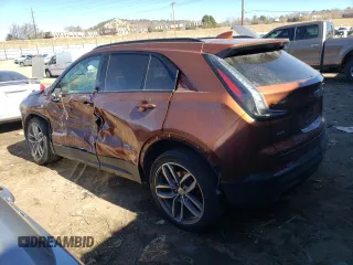2021 Cadillac XT4 AWD Sport with VIN 1GYFZFR42MF054048, listed as a Copart auction lot 42597083 with 27,825 mi miles. Bid and sale history available at carsss.com. Image 2.