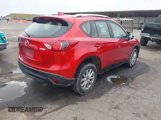 2015 Mazda CX-5 Sport z VIN JM3KE2BE9F0452625, wystawiony jako IAAI lot #42114867 z przebiegiem 167 849 mil mil oraz . Historia ofert i sprzedaży dostępna na DreamBid. Obrazek 4.