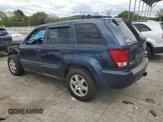 2009 Jeep Grand Cherokee Laredo with VIN 1J8HR48P49C545334, listed as a Copart auction lot 71562344 with 183,976 mi miles and Salvage Title. Bid and sale history available at carsss.com. Image 2.