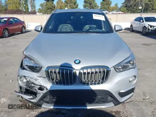 2017 BMW X1 xDrive28i z VIN WBXHT3Z34H4A53805, wystawiony jako IAAI lot #40682476 z przebiegiem 225 253 mil mil oraz . Historia ofert i sprzedaży dostępna na DreamBid. Obrazek 12.