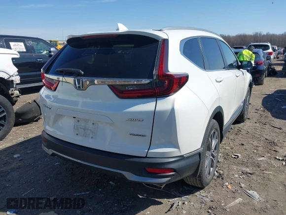 2020 Honda CR-V Touring with VIN 2HKRW2H99LH635892, listed as a IAAI auction lot 41822462 with 41,645 mi miles and . Bid and sale history available at DreamBid. Image 4.