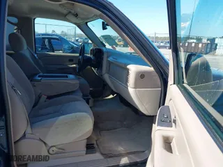 2005 Chevrolet Tahoe LS with VIN 1GNEC13VX5J162768, listed as a IAAI auction lot 41630000 with 239,483 mi miles. Bid and sale history available at carsss.com. Image 5.
