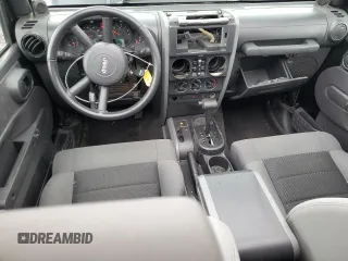 2008 Jeep Wrangler Unlimited X with VIN 1J4GA391X8L528349, listed as a Copart auction lot 57086935 with 134,061 mi miles and Salvage title. Bid and sale history available at DreamBid. Image 8.