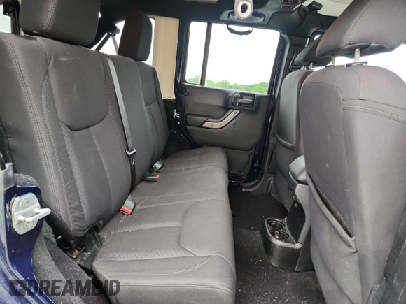 2013 Jeep Wrangler Unlimited Sport z VIN 1C4BJWDG9DL509685, wystawiony jako Copart lot #58521415 z przebiegiem 254 452 mil mil oraz Szkoda całkowita • Salvage title. Historia ofert i sprzedaży dostępna na DreamBid. Obrazek 10.