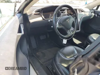 2014 Tesla Model S 60 with VIN 5YJSA1H12EFP51909, listed as a Copart auction lot 55489705 with Not Provided miles and Clean Title. Bid and sale history available at DreamBid. Image 8.