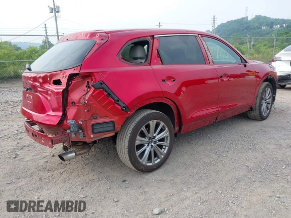 2021 Mazda CX-9 Signature with VIN JM3TCBEY2M0509874, listed as a IAAI auction lot 42492202 with 69,153 mi miles and . Bid and sale history available at DreamBid. Image 4.