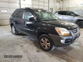 2005 Kia Sportage LX with VIN KNDJE723X57131795, listed as a Copart auction lot 79035214 with 146,746 mi miles and Salvage Title. Bid and sale history available at carsss.com. Image 4.