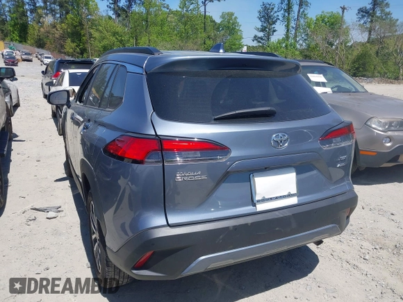 2023 Toyota Corolla Cross XLE z VIN 7MUDAABG7PV049417, wystawiony jako IAAI lot #42037055 z przebiegiem 28 325 mil mil oraz . Historia ofert i sprzedaży dostępna na DreamBid. Obrazek 3.