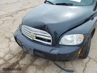 2011 Chevrolet HHR LS with VIN 3GNBAAFW1BS560779, listed as a IAAI auction lot 41590007 with NaN miles. Bid and sale history available at carsss.com. Image 6.