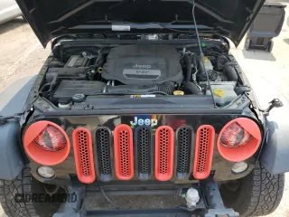 2016 Jeep Wrangler Black Bear z VIN 1C4AJWAG2GL330098, wystawiony jako Copart lot #59018845 z przebiegiem 84 039 mil mil oraz Szkoda całkowita • Salvage title. Historia ofert i sprzedaży dostępna na DreamBid. Obrazek 11.