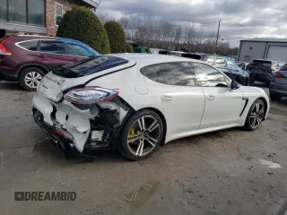2014 Porsche Panamera z VIN WP0AA2A74EL010108, wystawiony jako Copart lot #85194254 z przebiegiem 77 568 mil mil oraz Czysty tytuł • Clean title. Historia ofert i sprzedaży dostępna na DreamBid. Obrazek 3.