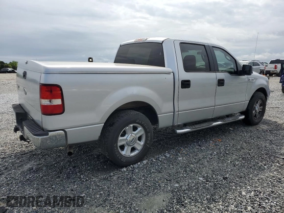 2005 Ford F-150 XLT with VIN 1FTRW12WX5FA79128, listed as a Copart auction lot 51963585 with 169,045 mi miles and Salvage Title. Bid and sale history available at carsss.com. Image 3.