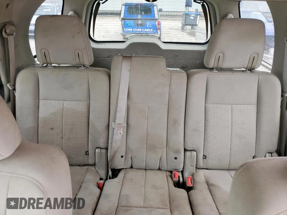 2013 Ford Expedition XLT z VIN 1FMJU1J51DEF09236, wystawiony jako Copart lot #57498685 z przebiegiem 266 883 mil mil oraz Szkoda całkowita • Salvage title. Historia ofert i sprzedaży dostępna na DreamBid. Obrazek 10.