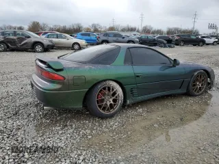 1992 Mitsubishi 3000GT z VIN JA3XE74C2NY028905, wystawiony jako Copart lot #87641175 z przebiegiem 131 349 mil mil oraz Szkody całkowita. Historia ofert i sprzedaży dostępna na DreamBid. Obrazek 3.