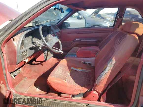 1987 Ford Thunderbird with VIN 1FABP6034HH150617, listed as a Copart auction lot 88818505 with 115,619 mi miles and Salvage Title. Bid and sale history available at carsss.com. Image 7.