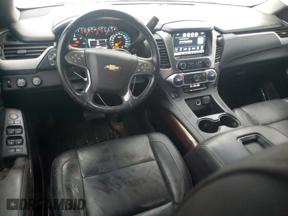 2016 Chevrolet Suburban LT with VIN 1GNSKHKC1GR257416, listed as a Copart auction lot 80993814 with 142,470 mi miles and Salvage Title. Bid and sale history available at DreamBid. Image 8.