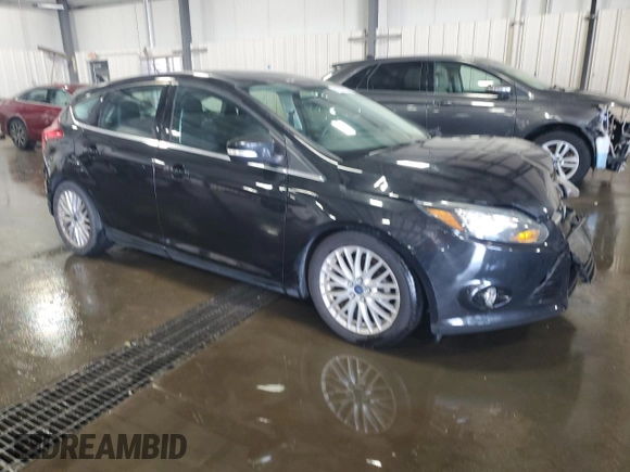 2014 Ford Focus Titanium with VIN 1FADP3N2XEL131392, listed as a Copart auction lot 61665025 with 105,597 mi miles and Salvage title. Bid and sale history available at DreamBid. Image 4.