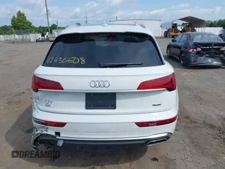 2023 Audi Q5 S line Premium Plus z VIN WA1EAAFY9P2148081, wystawiony jako IAAI lot #42436508 z przebiegiem 25 877 mil mil oraz . Historia ofert i sprzedaży dostępna na DreamBid. Obrazek 16.