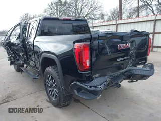 2022 GMC Sierra 1500 Limited AT4 with VIN 3GTP9EEL4NG213122, listed as a IAAI auction lot 41582519 with 85,936 mi miles. Bid and sale history available at carsss.com. Image 3.