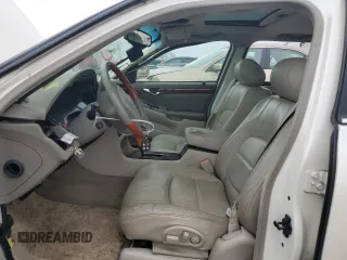 2000 Cadillac DeVille DTS z VIN 1G6KF5797YU263599, wystawiony jako Copart lot #81576484 z przebiegiem 118 414 mil mil oraz Szkoda całkowita • Salvage title. Historia ofert i sprzedaży dostępna na DreamBid. Obrazek 7.