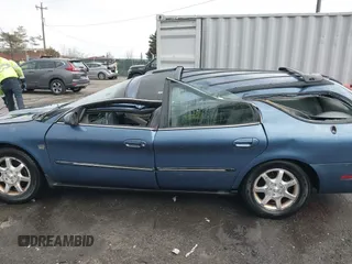2002 Mercury Sable LS Premium with VIN 1MEHM59S02A614938, listed as a IAAI auction lot 41640570 with 86,549 mi miles and . Bid and sale history available at DreamBid. Image 14.