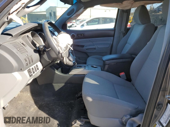 2015 Toyota Tacoma with VIN 3TMLU4EN7FM164526, listed as a Copart auction lot 50977395 with 124,222 mi miles and Salvage Title. Bid and sale history available at carsss.com. Image 7.