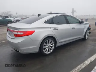 2014 Hyundai Azera Limited with VIN KMHFH4JG7EA388931, listed as a IAAI auction lot 41468407 with 130,597 mi miles and . Bid and sale history available at DreamBid. Image 4.