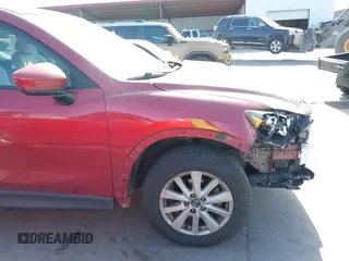 2013 Mazda CX-5 Touring with VIN JM3KE2CE9D0117750, listed as a IAAI auction lot 41858518 with 90,610 mi miles and . Bid and sale history available at carsss.com. Image 6.