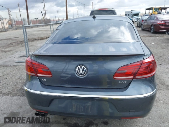 2013 Volkswagen CC Sport with VIN WVWBP7AN3DE571837, listed as a IAAI auction lot 41784447 with 156,834 mi miles. Bid and sale history available at carsss.com. Image 16.