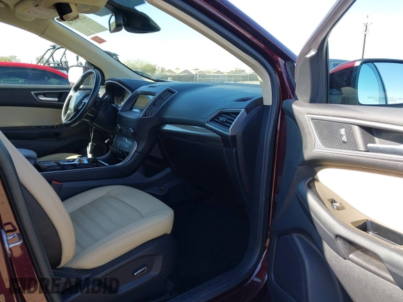 2019 Ford Edge SEL z VIN 2FMPK4J9XKBB10449, wystawiony jako IAAI lot #41614536 z przebiegiem 83 879 mil mil oraz . Historia ofert i sprzedaży dostępna na DreamBid. Obrazek 5.