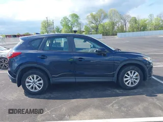 2016 Mazda CX-5 Sport with VIN JM3KE2BY3G0740488, listed as a IAAI auction lot 42000449 with 43,009 mi miles. Bid and sale history available at carsss.com. Image 13.