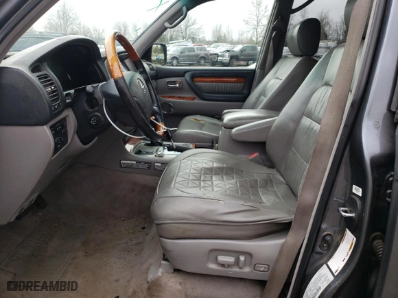 2004 Lexus LX 470 with VIN JTJHT00W443536417, listed as a Copart auction lot 88842505 with 215,692 mi miles and Salvage Title. Bid and sale history available at carsss.com. Image 7.