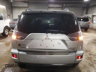 2010 Mitsubishi Outlander XLS z VIN JA4JT4AX9AZ002688, wystawiony jako Copart lot #51173605 z przebiegiem 162 147 mil mil oraz Szkoda całkowita • Salvage title. Historia ofert i sprzedaży dostępna na DreamBid. Obrazek 6.