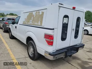 2014 Ford F-150 XL with VIN 1FTMF1CM5EKG22867, listed as a IAAI auction lot 42000275 with 200,657 mi miles. Bid and sale history available at carsss.com. Image 1.